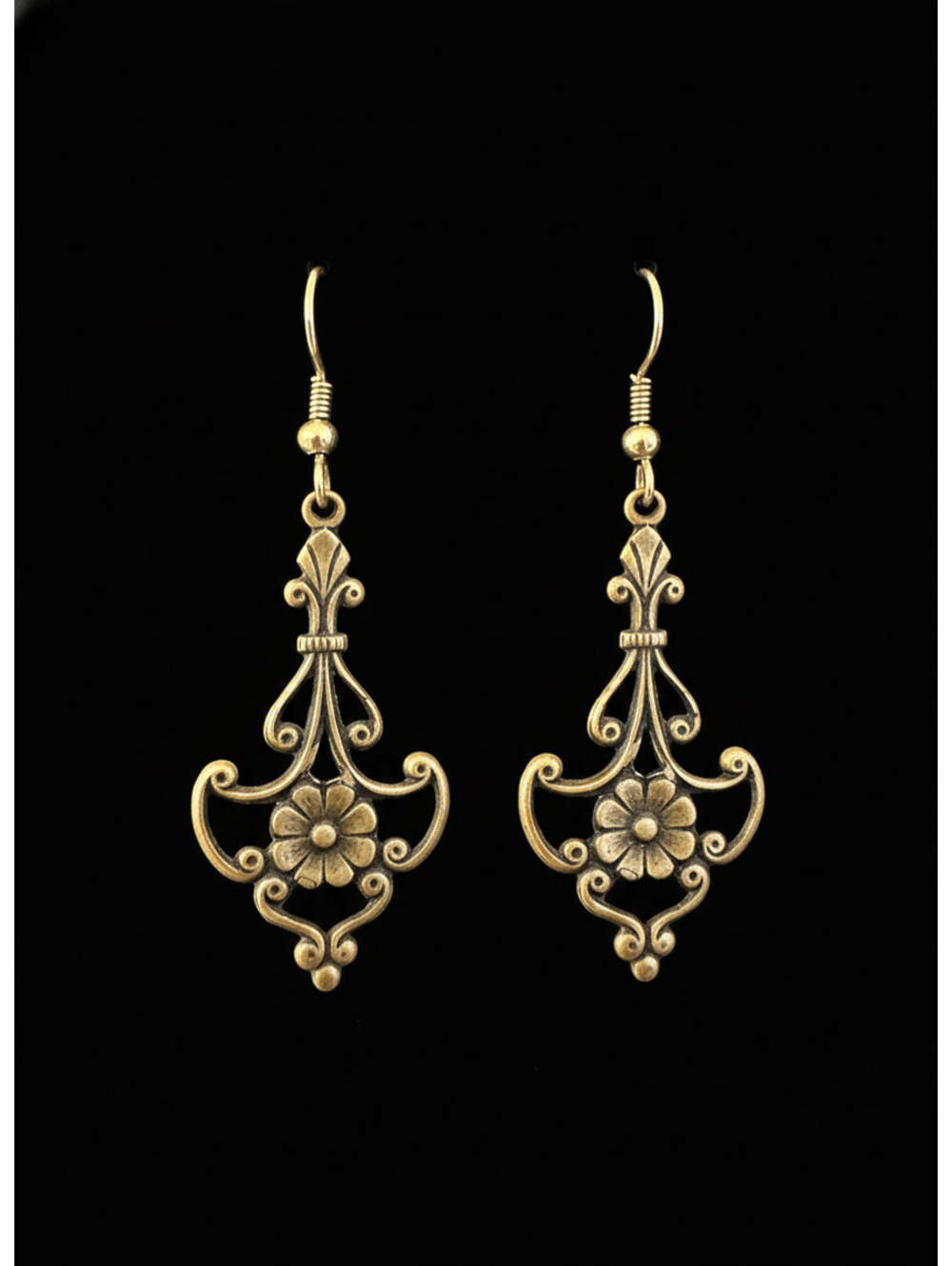 Silver tone floral filigree dangle earrings